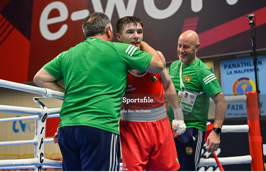 8 March 2024; Jude Gallagher of Ireland celebrates with Ireland coach Zaur Antia, left, after his victory in the Men's 57kg Round of 32 bout against Uddin Mohammed Hussam of India during day six at the Paris 2024 Olympic Boxing Qualification Tournament at E-Work Arena in Busto Arsizio, Italy. Photo by Ben McShane/Sportsfile