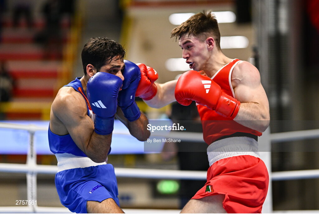 8 March 2024; Jude Gallagher of Ireland, right, in action against Uddin Mohammed Hussam of India during their Men's 57kg Round of 32 bout during day six at the Paris 2024 Olympic Boxing Qualification Tournament at E-Work Arena in Busto Arsizio, Italy. Photo by Ben McShane/Sportsfile