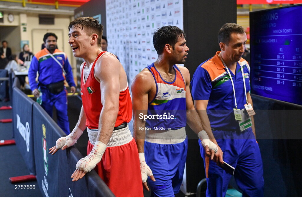 8 March 2024; Jude Gallagher of Ireland is interviewed after his victory in the Men's 57kg Round of 32 bout against Uddin Mohammed Hussam of India, right, during day six at the Paris 2024 Olympic Boxing Qualification Tournament at E-Work Arena in Busto Arsizio, Italy. Photo by Ben McShane/Sportsfile