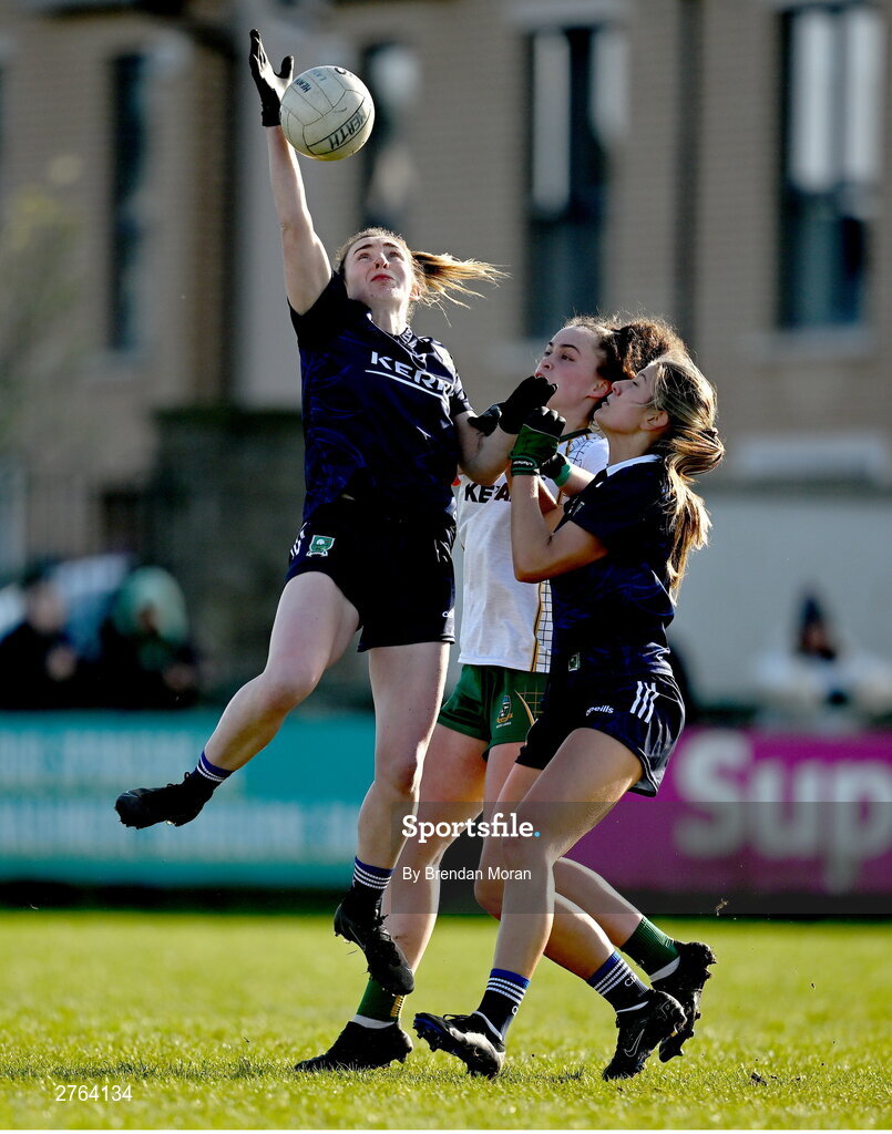 17 March 2024; Cáit Lynch of Kerry, left, in action against teammate Ciara Murphy and Emma Duggan of Meath during the Lidl LGFA National League Division 1 Round 6 match between Meath and Kerry at Donaghmore Ashbourne GAA Club in Ashbourne, Meath. Photo by Brendan Moran/Sportsfile