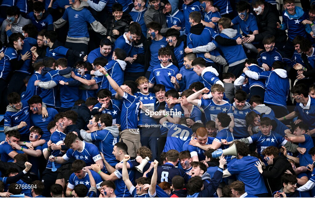 20 March 2024; St Mary’s College supporters celebrate their side's first try during the Bank of Ireland Leinster Schools Junior Cup final match between St Mary's College and Terenure College at Energia Park in Dublin. Photo by Harry Murphy/Sportsfile