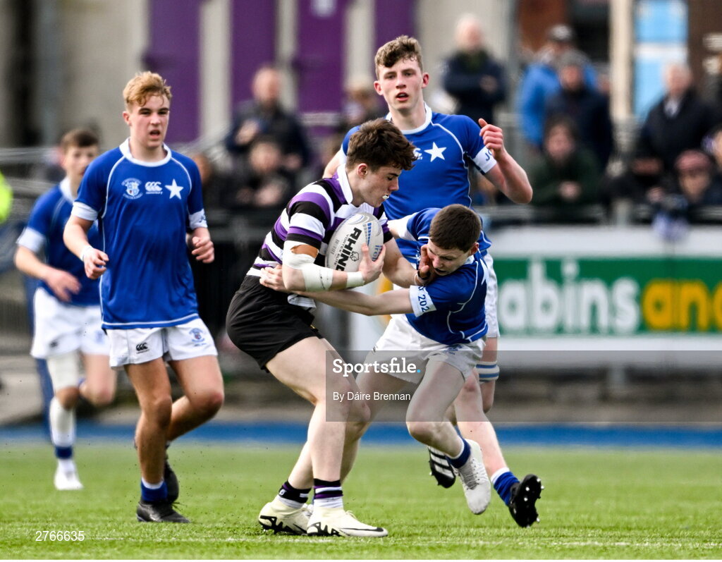 20 March 2024; Senan Gavin of Terenure College is tackled by Tom O’Keefe of St Mary’s College during the Bank of Ireland Leinster Schools Junior Cup final match between St Mary's College and Terenure College at Energia Park in Dublin. Photo by Daire Brennan/Sportsfile