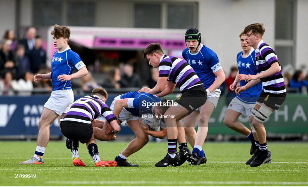 20 March 2024; Eoghan Brady of St Mary’s College is tackled by Ewan McGinty of Terenure College during the Bank of Ireland Leinster Schools Junior Cup final match between St Mary's College and Terenure College at Energia Park in Dublin. Photo by Daire Brennan/Sportsfile