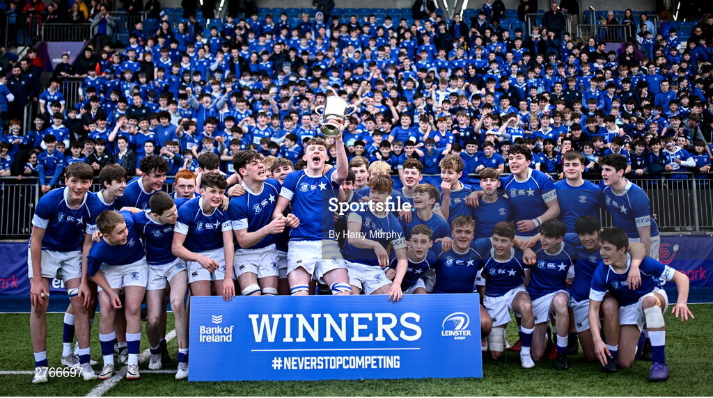 20 March 2024; St Mary’s College captain Eoin Farrell lifts the trophy after his side's victory in the Bank of Ireland Leinster Schools Junior Cup final match between St Mary's College and Terenure College at Energia Park in Dublin. Photo by Harry Murphy/Sportsfile