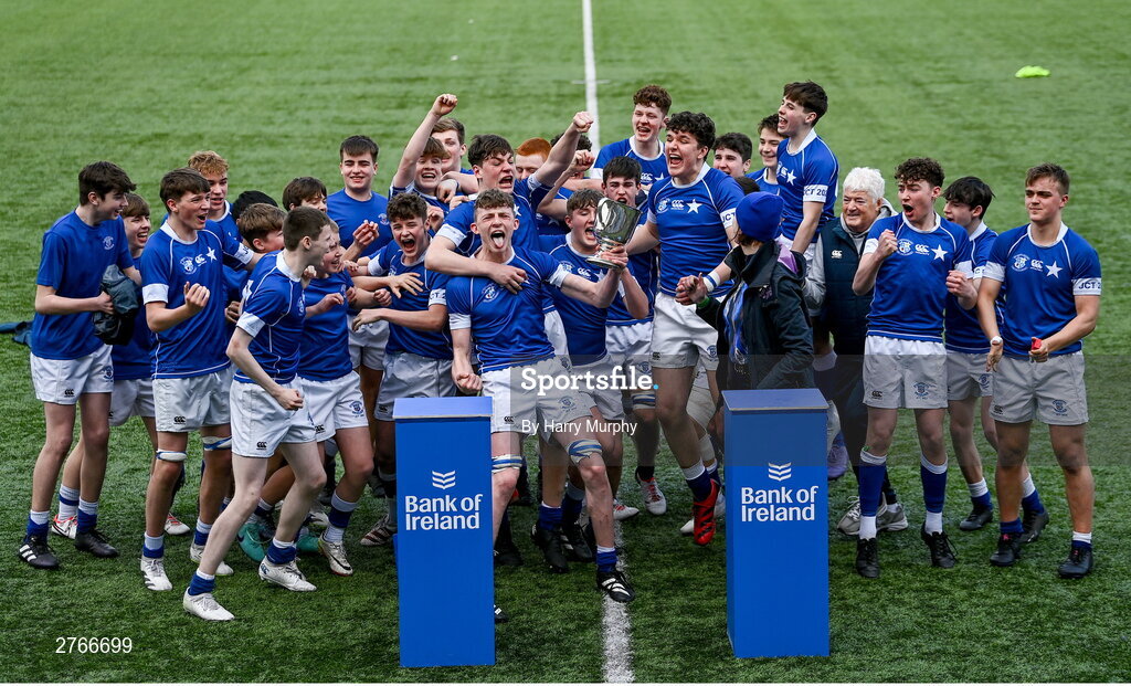 20 March 2024; St Mary’s College captain Eoin Farrell lifts the trophy after his side's victory in the Bank of Ireland Leinster Schools Junior Cup final match between St Mary's College and Terenure College at Energia Park in Dublin. Photo by Harry Murphy/Sportsfile