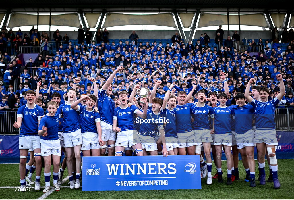 20 March 2024; St Mary’s College captain Eoin Farrell lifts the trophy after his side's victory in the Bank of Ireland Leinster Schools Junior Cup final match between St Mary's College and Terenure College at Energia Park in Dublin. Photo by Harry Murphy/Sportsfile
