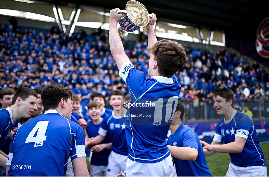 20 March 2024; Nic Sheehan of St Mary’s College lifts the trophy after his side's victory in the Bank of Ireland Leinster Schools Junior Cup final match between St Mary's College and Terenure College at Energia Park in Dublin. Photo by Harry Murphy/Sportsfile