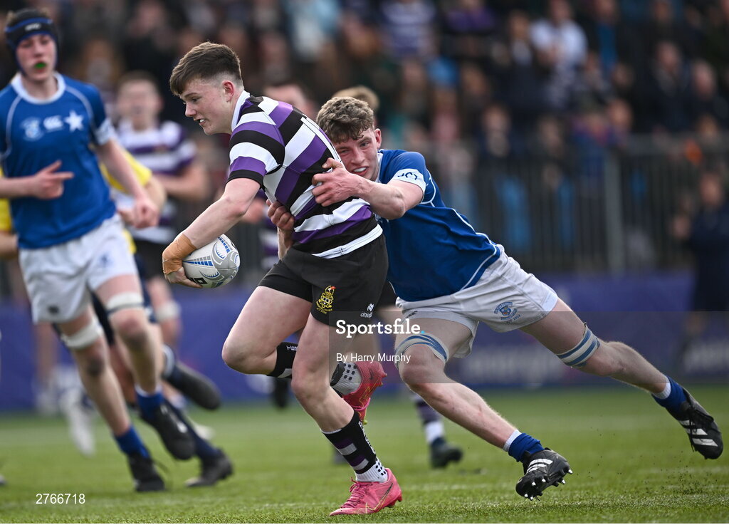 20 March 2024; Tommy Smyth of Terenure College is tackled by Eoin Farrell of St Mary’s College during the Bank of Ireland Leinster Schools Junior Cup final match between St Mary's College and Terenure College at Energia Park in Dublin. Photo by Harry Murphy/Sportsfile