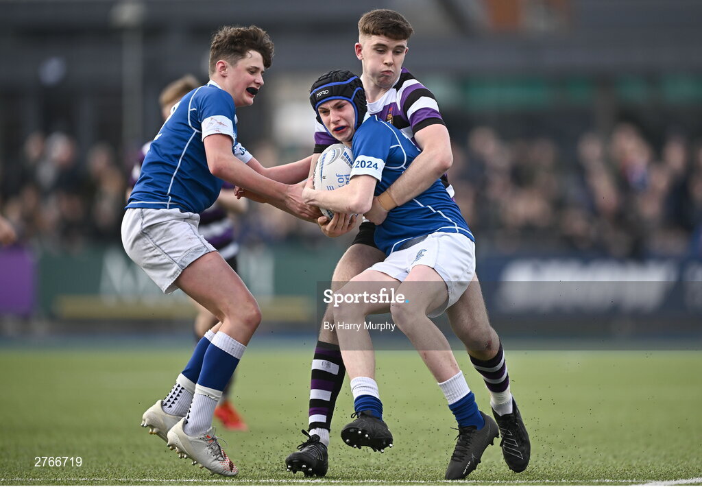 20 March 2024; Cian Dunphy of St Mary’s College is tackled by Niall Fallon of Terenure College during the Bank of Ireland Leinster Schools Junior Cup final match between St Mary's College and Terenure College at Energia Park in Dublin. Photo by Harry Murphy/Sportsfile