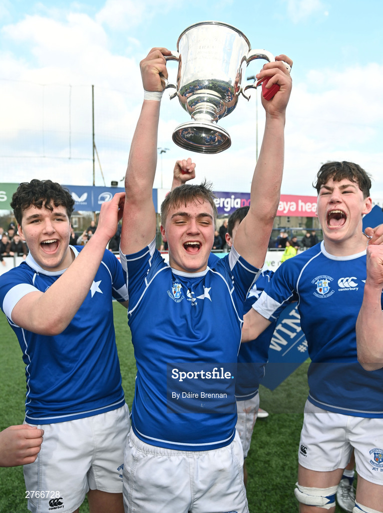 20 March 2024; Eoghan Brady of St Mary’s College lifts the cup after the Bank of Ireland Leinster Schools Junior Cup final match between St Mary's College and Terenure College at Energia Park in Dublin. Photo by Daire Brennan/Sportsfile