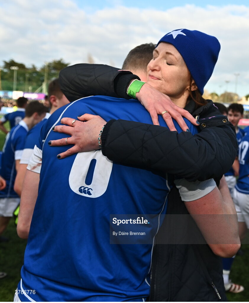 20 March 2024; Eoin Farrell of St Mary’s College celebrates with his mother Julie after the Bank of Ireland Leinster Schools Junior Cup final match between St Mary's College and Terenure College at Energia Park in Dublin. Photo by Daire Brennan/Sportsfile