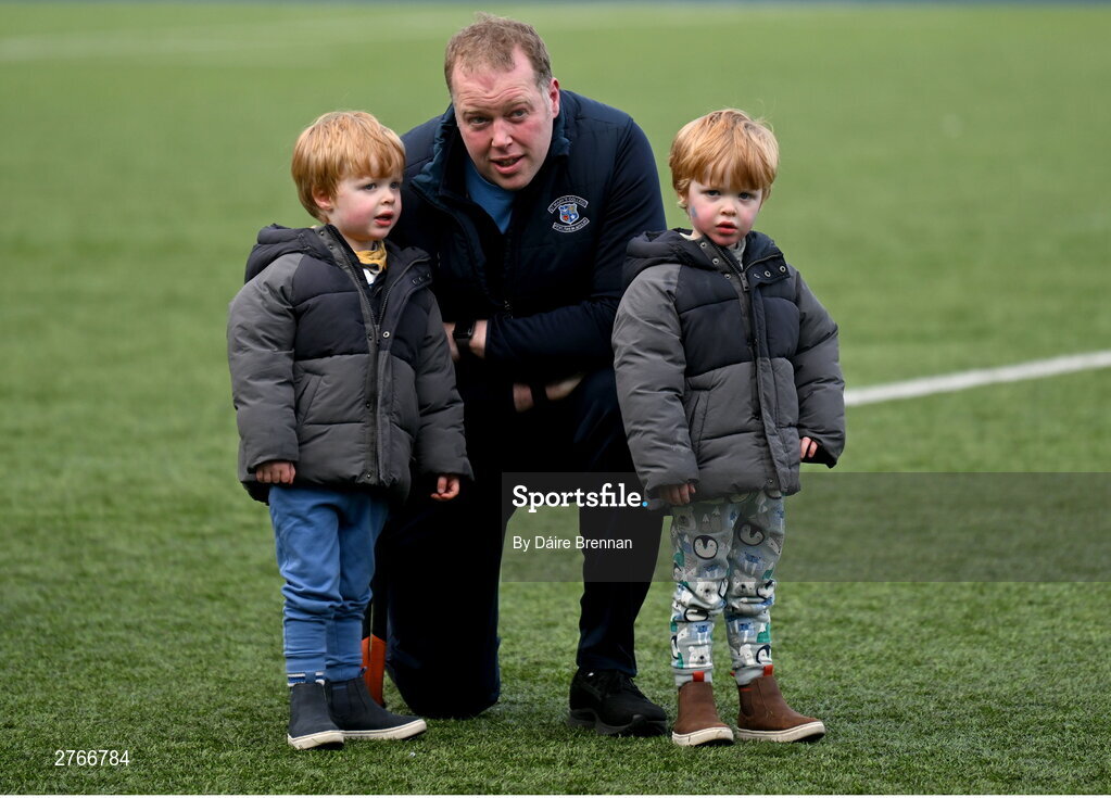 20 March 2024; St Mary's College coach Jamie Cornett celebrates with his sons Luke and Timothy, aged 3, after the Bank of Ireland Leinster Schools Junior Cup final match between St Mary's College and Terenure College at Energia Park in Dublin. Photo by Daire Brennan/Sportsfile
