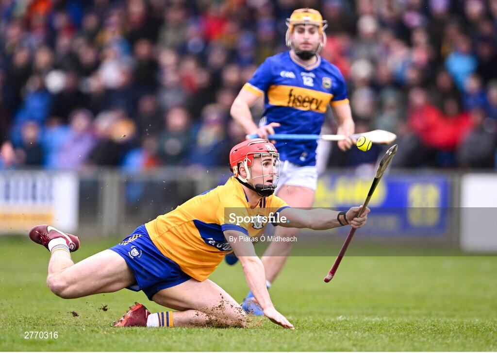 24 March 2024; Darragh Lohan of Clare in action against Conor Stakelum of Tipperary during the Allianz Hurling League Division 1 semi-final match between Clare and Tipperary at Laois Hire O'Moore Park in Portlaoise, Laois. Photo by Piaras Ó Mídheach/Sportsfile