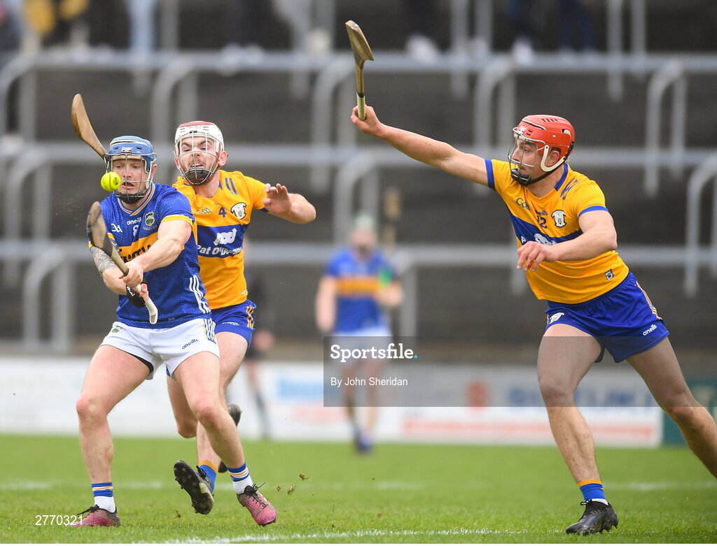 24 March 2024; Willie Connors of Tipperary in action against Clare players from left, Conor Leen and Peter Duggan during the Allianz Hurling League Division 1 semi-final match between Clare and Tipperary at Laois Hire O'Moore Park in Portlaoise, Laois. Photo by John Sheridan/Sportsfile