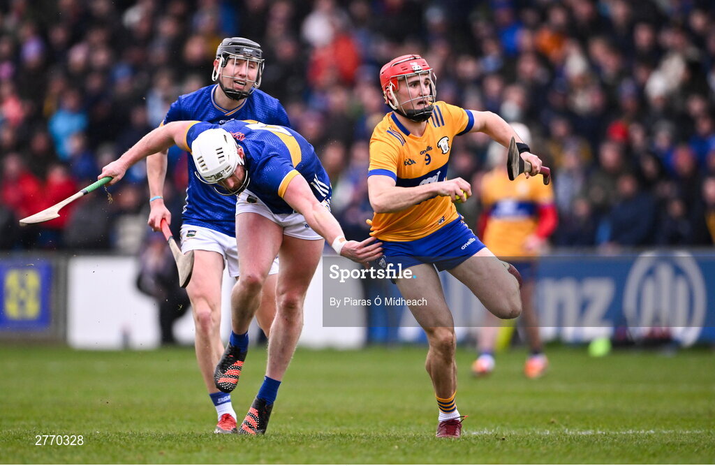 24 March 2024; Darragh Lohan of Clare in action against Michael Breen of Tipperary during the Allianz Hurling League Division 1 semi-final match between Clare and Tipperary at Laois Hire O'Moore Park in Portlaoise, Laois. Photo by Piaras Ó Mídheach/Sportsfile