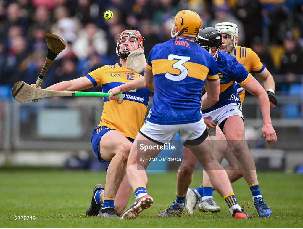 24 March 2024; Peter Duggan of Clare in action against Ronan Maher, 3, and Dan McCormack of Tipperary during the Allianz Hurling League Division 1 semi-final match between Clare and Tipperary at Laois Hire O'Moore Park in Portlaoise, Laois. Photo by Piaras Ó Mídheach/Sportsfile