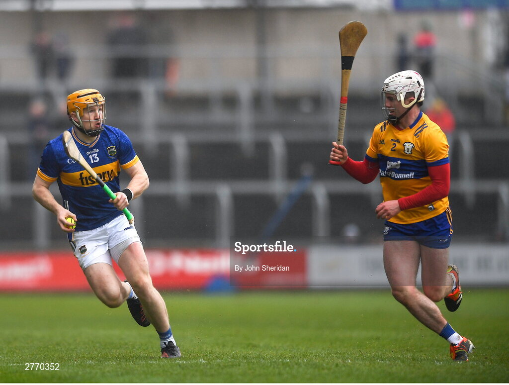 24 March 2024; Jake Morris of Tipperary in action against Adam Hogan of Clare during the Allianz Hurling League Division 1 semi-final match between Clare and Tipperary at Laois Hire O'Moore Park in Portlaoise, Laois. Photo by John Sheridan/Sportsfile