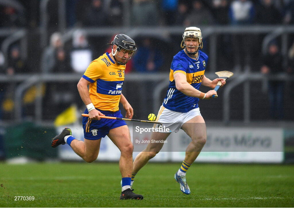 24 March 2024; David Reidy of Clare in action against Bryan O'Mara of Tipperary during the Allianz Hurling League Division 1 semi-final match between Clare and Tipperary at Laois Hire O'Moore Park in Portlaoise, Laois. Photo by John Sheridan/Sportsfile