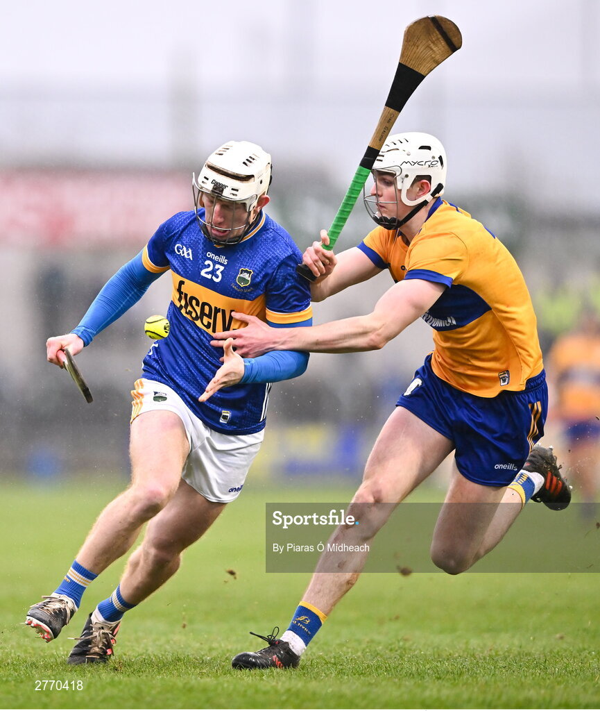 24 March 2024; Séan Ryan of Tipperary in action against Cian Galvin of Clare during the Allianz Hurling League Division 1 semi-final match between Clare and Tipperary at Laois Hire O'Moore Park in Portlaoise, Laois. Photo by Piaras Ó Mídheach/Sportsfile
