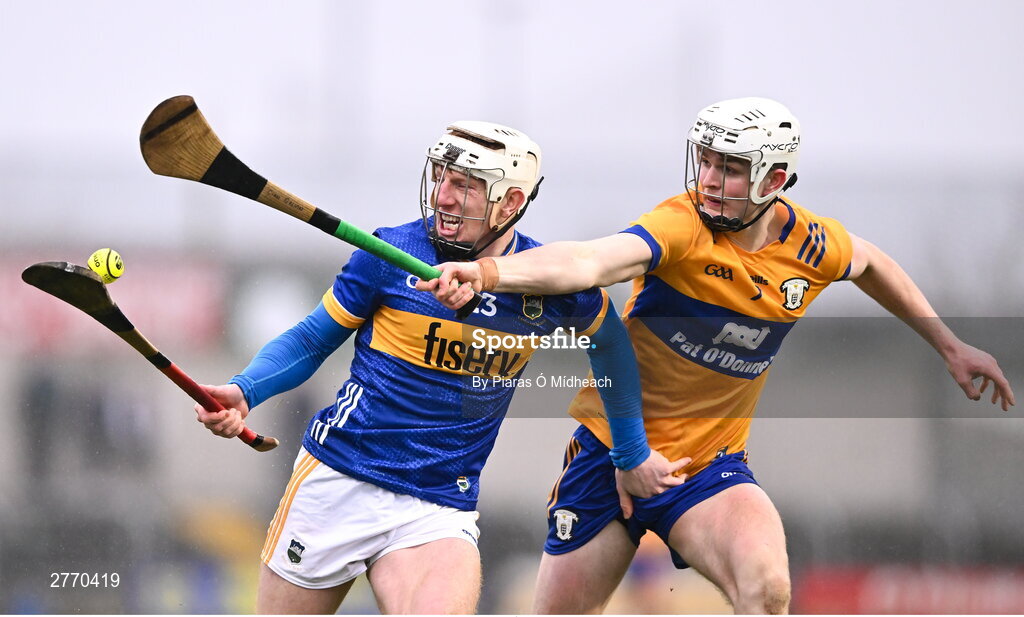 24 March 2024; Séan Ryan of Tipperary in action against Cian Galvin of Clare during the Allianz Hurling League Division 1 semi-final match between Clare and Tipperary at Laois Hire O'Moore Park in Portlaoise, Laois. Photo by Piaras Ó Mídheach/Sportsfile
