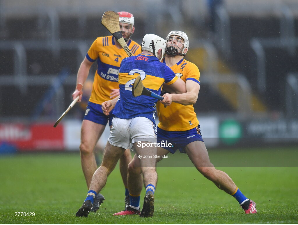 24 March 2024; Craig Morgan of Tipperary is tackled by Aidan McCarthy of Clare during the Allianz Hurling League Division 1 semi-final match between Clare and Tipperary at Laois Hire O'Moore Park in Portlaoise, Laois. Photo by John Sheridan/Sportsfile