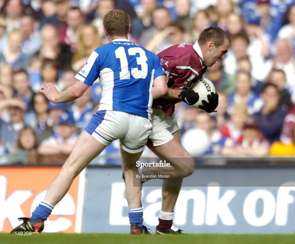 24 July 2004; Michael Ennis, Westmeath, in action against Brian McDonald, Laois. Bank of Ireland Leinster Senior Football Championship Final Replay, Westmeath v Laois, Croke Park, Dublin. Picture credit; Brendan Moran / SPORTSFILE