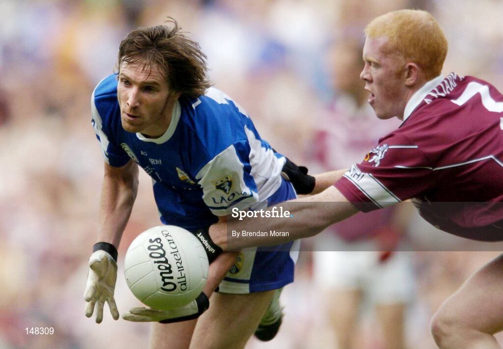 24 July 2004; Colm Parkinson, Laois, in action against Donal O'Donoghue, Westmeath. Bank of Ireland Leinster Senior Football Championship Final Replay, Westmeath v Laois, Croke Park, Dublin. Picture credit; Brendan Moran / SPORTSFILE