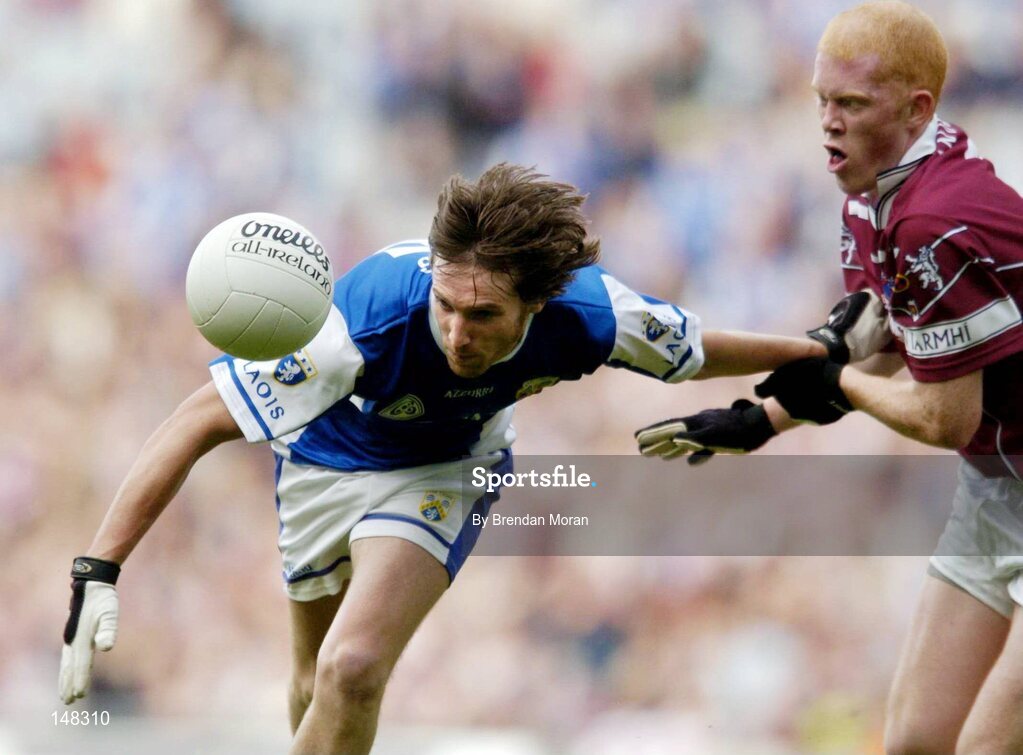24 July 2004; Colm Parkinson, Laois, in action against Donal O'Donoghue, Westmeath. Bank of Ireland Leinster Senior Football Championship Final Replay, Westmeath v Laois, Croke Park, Dublin. Picture credit; Brendan Moran / SPORTSFILE