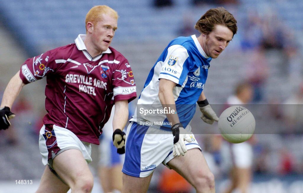 24 July 2004; Colm Parkinson, Laois, in action against Donal O'Donoghue, Westmeath. Bank of Ireland Leinster Senior Football Championship Final Replay, Westmeath v Laois, Croke Park, Dublin. Picture credit; Ray McManus / SPORTSFILE