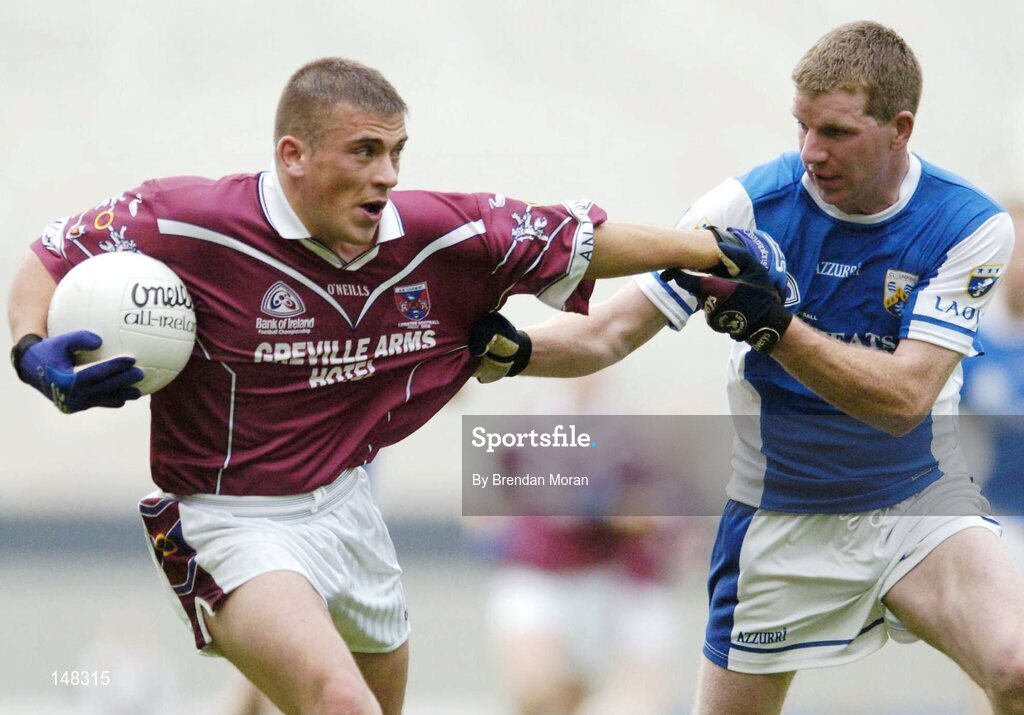 24 July 2004; Alan Mangan, Westmeath, in action against Paul McDonald, Laois. Bank of Ireland Leinster Senior Football Championship Final Replay, Westmeath v Laois, Croke Park, Dublin. Picture credit; Brendan Moran / SPORTSFILE