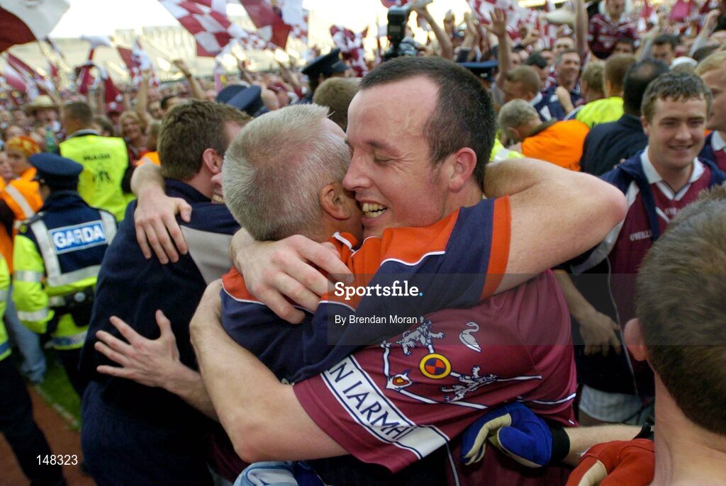 24 July 2004; Westmeath midfielder Rory O'Connell celebrates with manager Paidi O'Se after victory over Laois. Bank of Ireland Leinster Senior Football Championship Final Replay, Westmeath v Laois, Croke Park, Dublin. Picture credit; Brendan Moran / SPORTSFILE