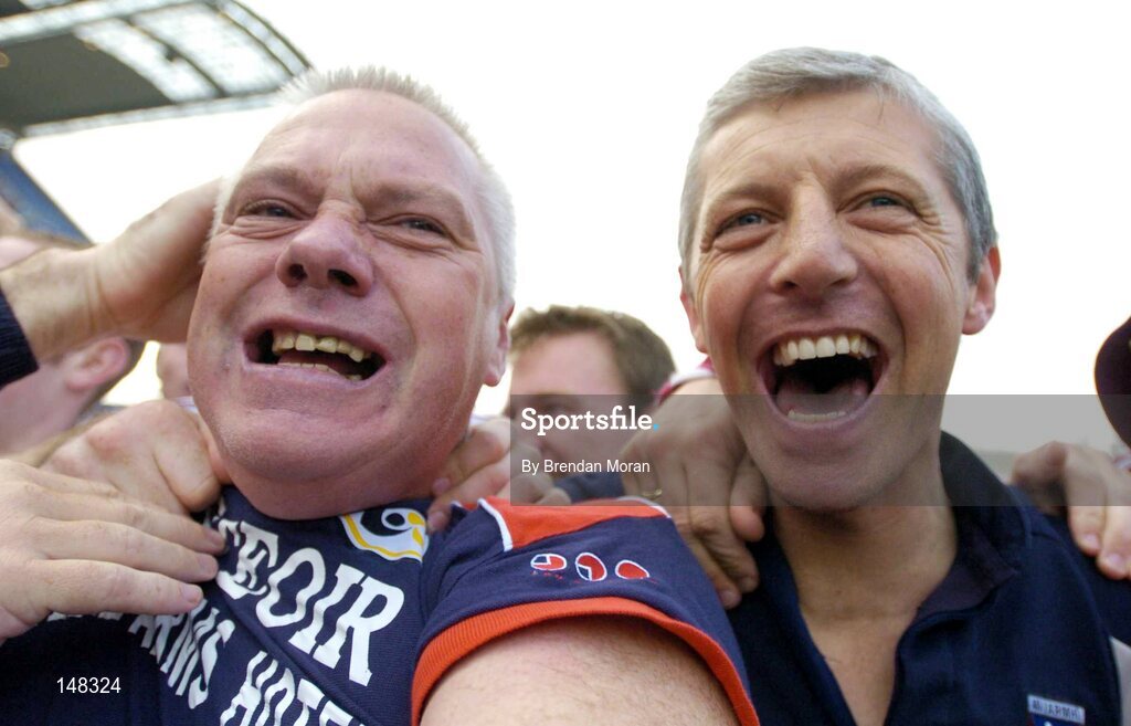 24 July 2004; Westmeath manager Paidi O'Se, left, and selector Tomas O'Flaharta celebrate after victory over Laois. Bank of Ireland Leinster Senior Football Championship Final Replay, Westmeath v Laois, Croke Park, Dublin. Picture credit; Brendan Moran / SPORTSFILE
