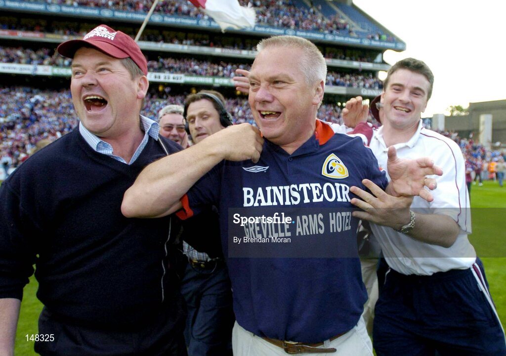 24 July 2004; Westmeath manager Paidi O'Se celebrates with fans after victory over Laois. Bank of Ireland Leinster Senior Football Championship Final Replay, Westmeath v Laois, Croke Park, Dublin. Picture credit; Brendan Moran / SPORTSFILE