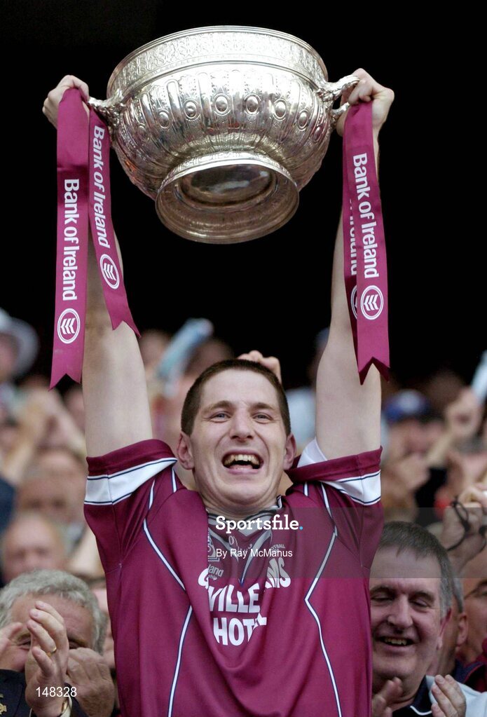 24 July 2004; The Westmeath captain David O'Shaughnessy lifts the cup after victory over Laois. Bank of Ireland Leinster Senior Football Championship Final Replay, Westmeath v Laois, Croke Park, Dublin. Picture credit; Ray McManus / SPORTSFILE