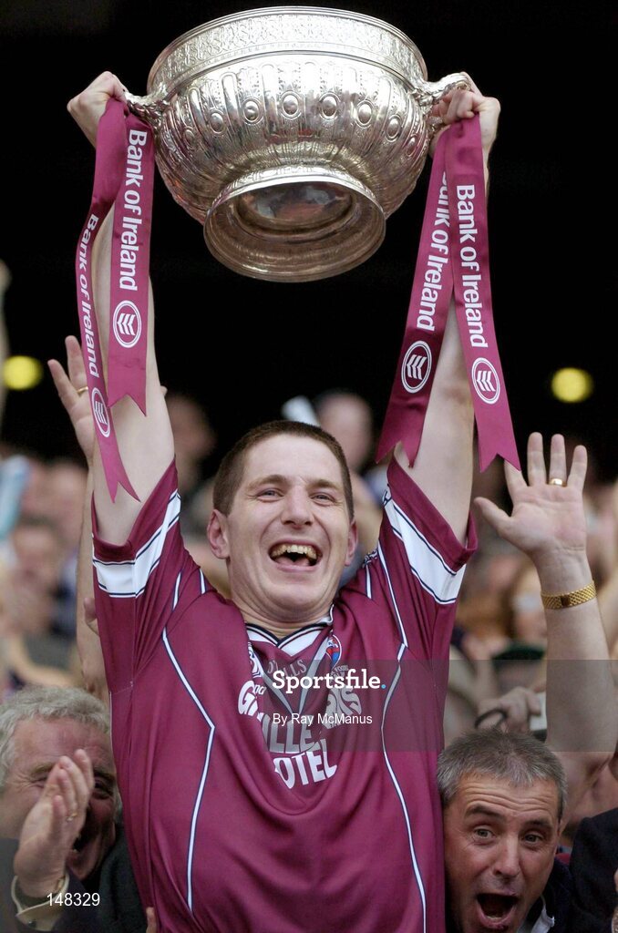 24 July 2004; The Westmeath captain David O'Shaughnessy lifts the cup after victory over Laois. Bank of Ireland Leinster Senior Football Championship Final Replay, Westmeath v Laois, Croke Park, Dublin. Picture credit; Ray McManus / SPORTSFILE