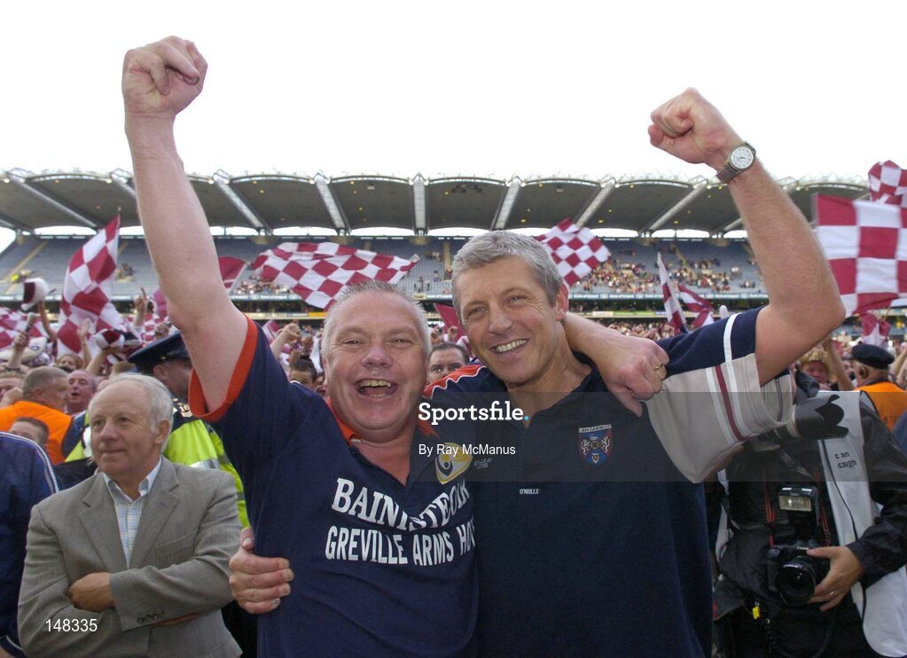 24 July 2004; Westmeath manager Páidí Ó Sé, left, and selector Tomás Ó FLatharta celebrate victory over Laois. Bank of Ireland Leinster Senior Football Championship Final Replay, Westmeath v Laois, Croke Park, Dublin. Picture credit; Ray McManus / SPORTSFILE