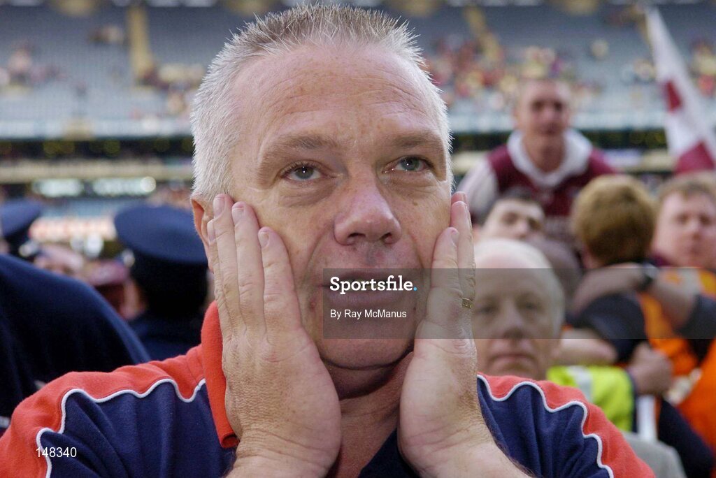 24 July 2004; Westmeath manager Paidi O Se pauses for a moment after victory over Laois. Bank of Ireland Leinster Senior Football Championship Final Replay, Westmeath v Laois, Croke Park, Dublin. Picture credit; Ray McManus / SPORTSFILE