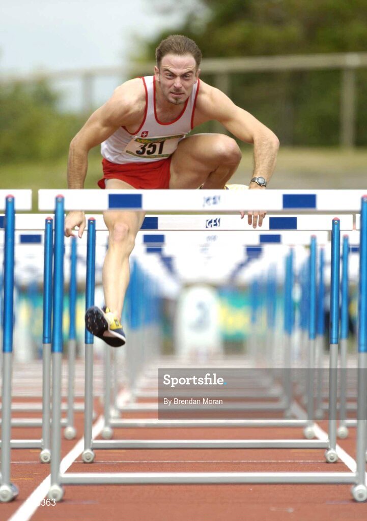 25 July 2004; Peter Coghlan, Crusaders AC, on his way to victory in the Men's 110m Final. AAI Senior Track and Field Championships, Morton Stadium, Santry, Dublin. Picture credit; Brendan Moran / SPORTSFILE