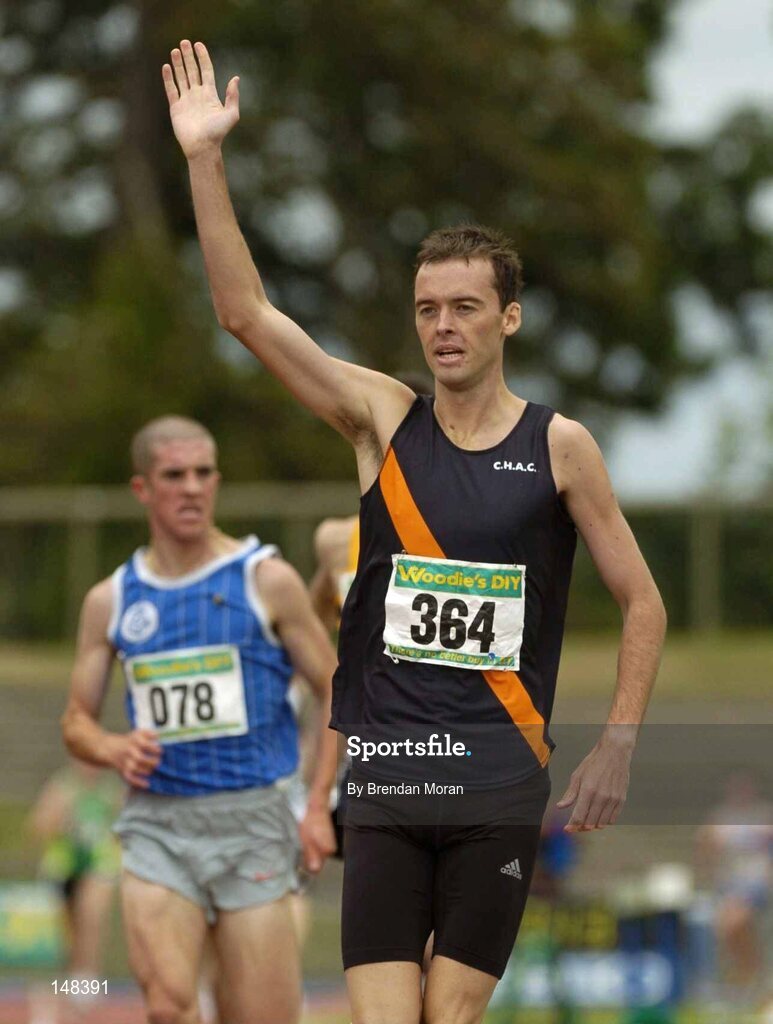 25 July 2004; Alastair Cragg, Clonliffe Harriers AC, celebrates victory in the Men's 1500m Final ahead of second placed Colin Costello, Star of the Sea AC. AAI Senior Track and Field Championships, Morton Stadium, Santry, Dublin. Picture credit; Brendan Moran / SPORTSFILE