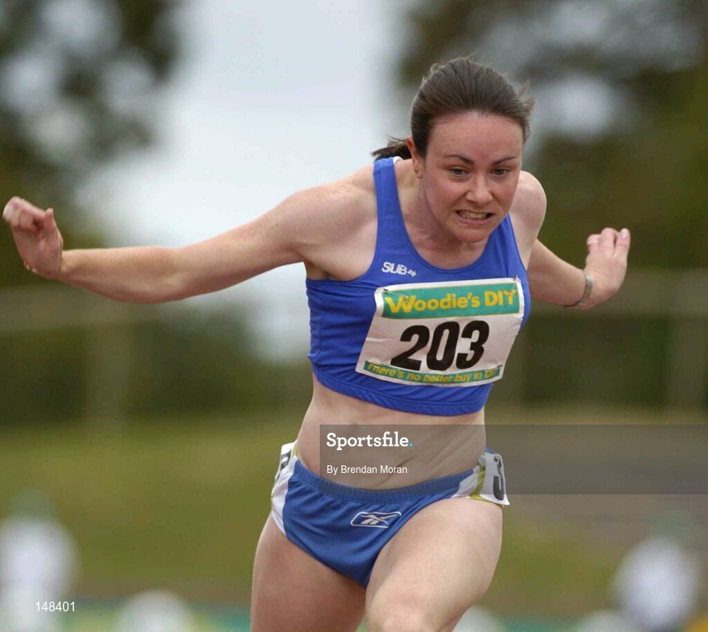 25 July 2004; Ciara Sheehy, Dublin City Harriers AC, crosses the line to win the Women's 100m Final. AAI Senior Track and Field Championships, Morton Stadium, Santry, Dublin. Picture credit; Brendan Moran / SPORTSFILE