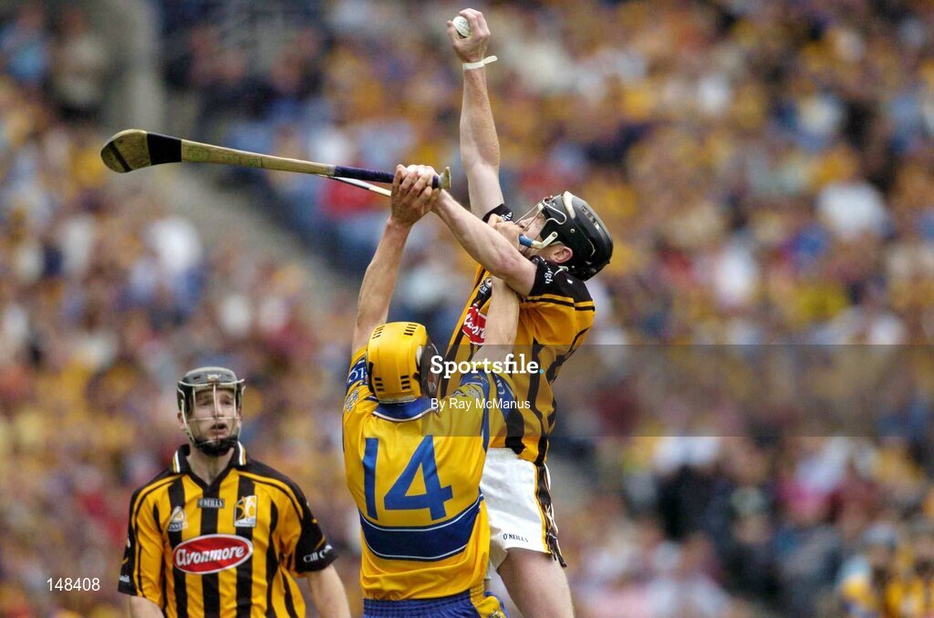 25 July 2004; Peter Barry, Kilkenny, wins possession from Clare's Tony Griffin. Guinness All-Ireland Senior Hurling Championship, Quarter Final, Clare v Kilkenny, Croke Park, Dublin. Picture credit; Ray McManus / SPORTSFILE