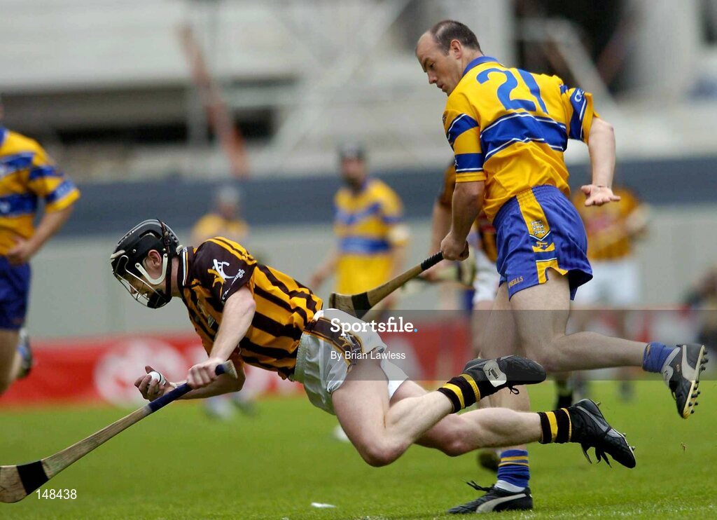 25 July 2004; Peter Barry, Kilkenny, in action against Ollie Baker, Clare. Guinness All-Ireland Senior Hurling Championship, Quarter Final, Clare v Kilkenny, Croke Park, Dublin. Picture credit; Brian Lawless / SPORTSFILE