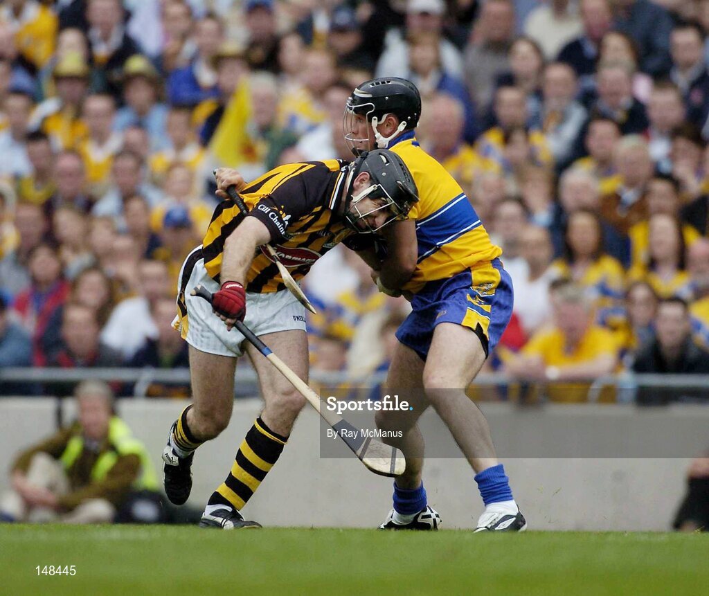 25 July 2004; DJ Carey, Kilkenny, is tackled by Clare's Alan Markham. Guinness All-Ireland Senior Hurling Championship, Quarter Final, Clare v Kilkenny, Croke Park, Dublin. Picture credit; Ray McManus / SPORTSFILE