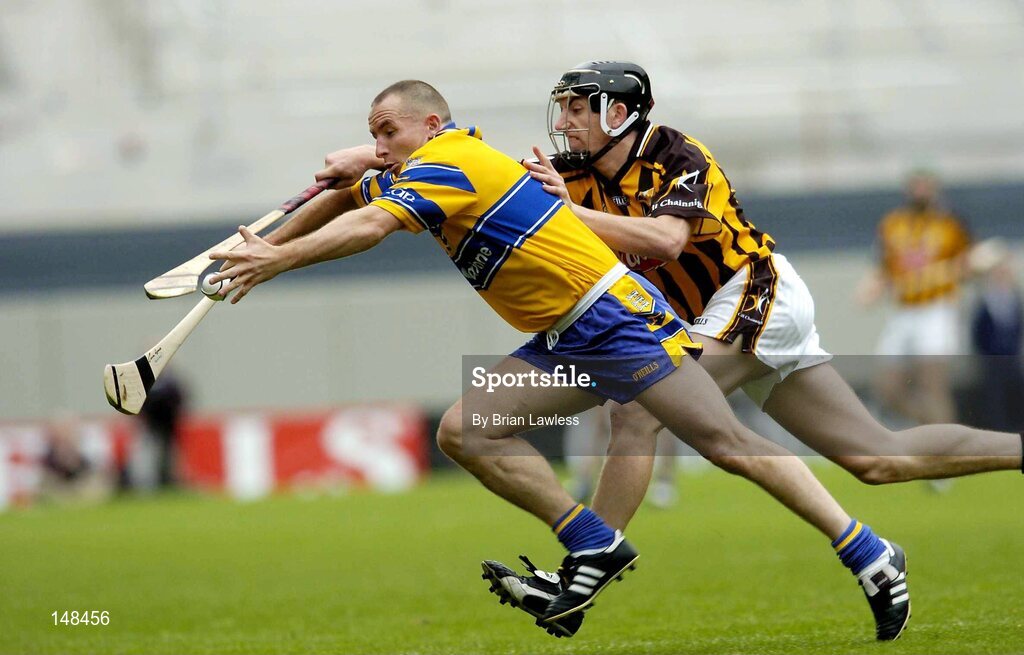 25 July 2004; Colin Lynch, Clare, in action against Derek Lyng, Kilkenny. Guinness All-Ireland Senior Hurling Championship, Quarter Final, Clare v Kilkkenny, Croke Park, Dublin. Picture credit; Brian Lawless / SPORTSFILE