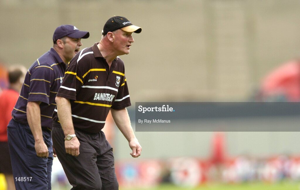 25 July 2004; Brian Cody, Kilkenny, and Anthony Daly, Clare. Guinness All-Ireland Senior Hurling Championship, Quarter Final, Clare v Kilkenny, Croke Park, Dublin. Picture credit; Ray McManus / SPORTSFILE