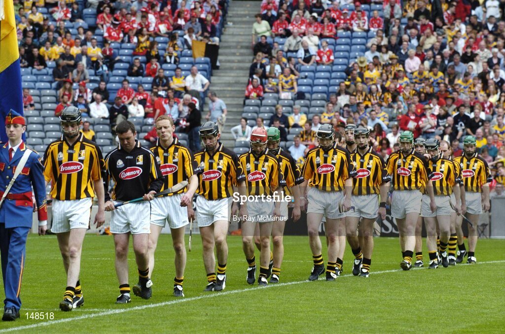 25 July 2004; The Kilkenny captain Martin Comerford leads the team during the parade. Guinness All-Ireland Senior Hurling Championship, Quarter Final, Clare v Kilkenny, Croke Park, Dublin. Picture credit; Ray McManus / SPORTSFILE