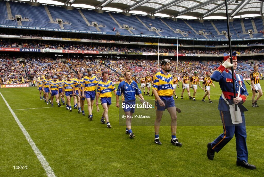 25 July 2004; The Clare captain Sean McMahon leads his team during the parade. Guinness All-Ireland Senior Hurling Championship, Quarter Final, Clare v Kilkenny, Croke Park, Dublin. Picture credit; Ray McManus / SPORTSFILE