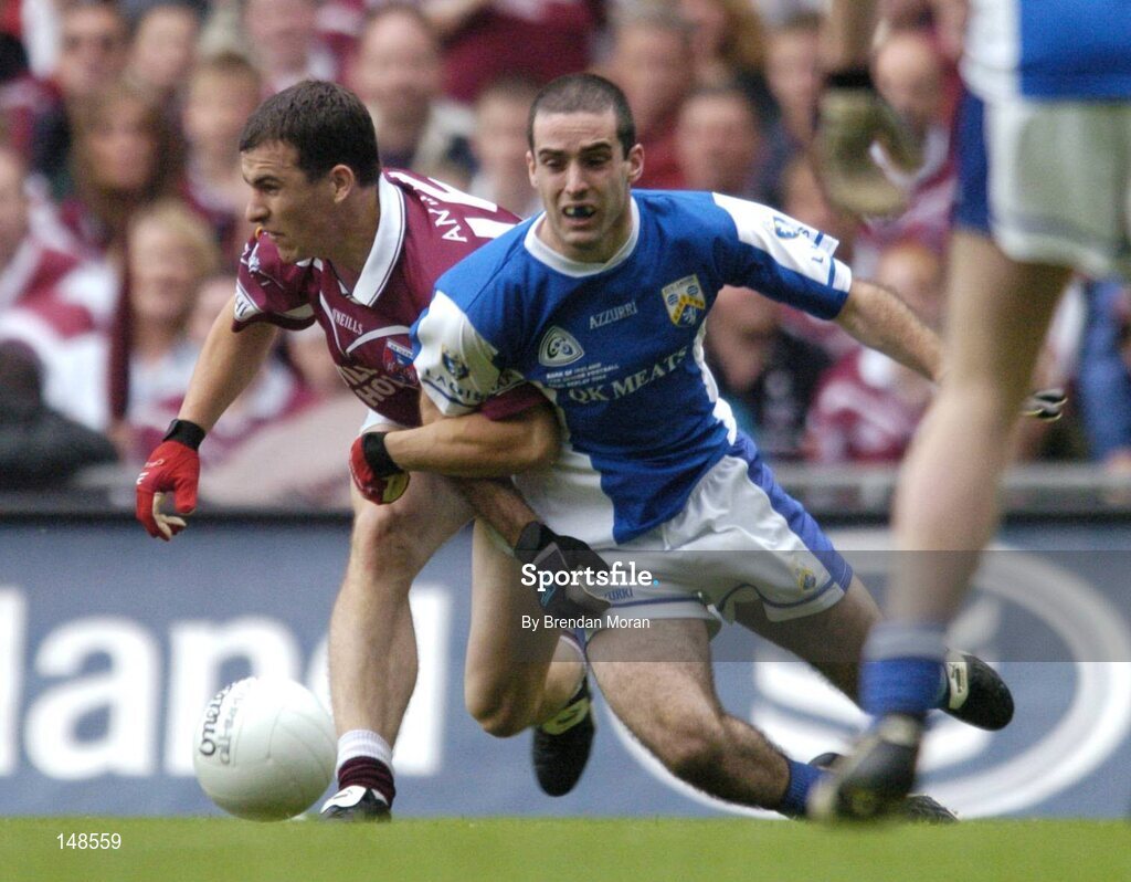 24 July 2004; Aidan Fennelly, Laois, in action against Dessie Dolan, Westmeath. Bank of Ireland Leinster Senior Football Championship Final Replay, Westmeath v Laois, Croke Park, Dublin. Picture credit; Brendan Moran / SPORTSFILE