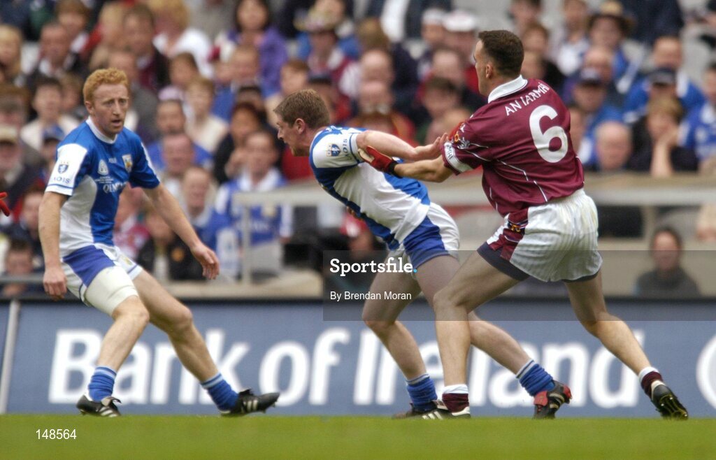 24 July 2004; Brian McDonald, Laois, in action against Damien Healy, Westmeath. Bank of Ireland Leinster Senior Football Championship Final Replay, Westmeath v Laois, Croke Park, Dublin. Picture credit; Brendan Moran / SPORTSFILE