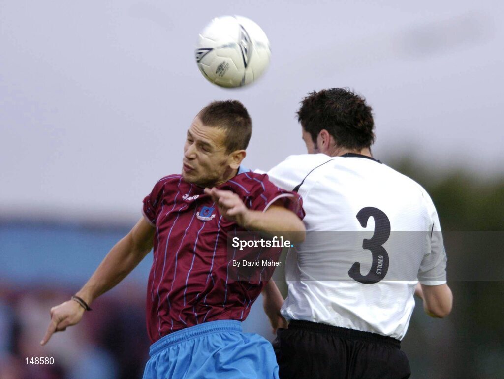 26 July 2004; Declan O'Brien, Drogheda United, in action against Brendan Kelly, Dundalk. FAI Carlsberg Cup, Second Round Replay, Drogheda United v Dundalk, United Park, Drogheda, Co. Louth. Picture credit; David Maher / SPORTSFILE